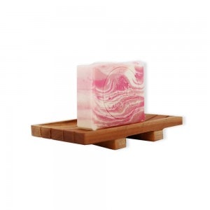 natural soap - rose geranium bar on soap dish side view
